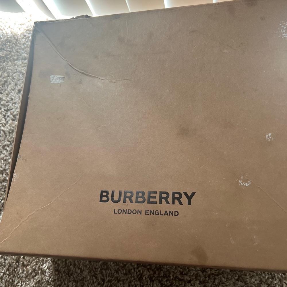 Burberry women shoe size 7.